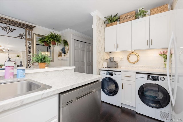 9620 W Chatfield Ave Unit D, Littleton, CO 80128 - laundry room featuring dark wood finished floors, separate washer and dryer, and ornamental molding