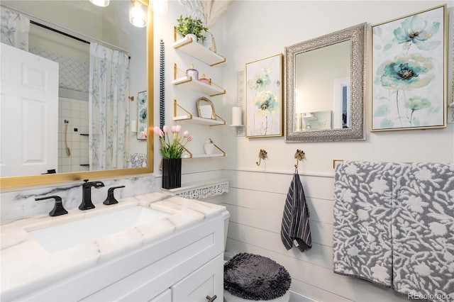 9620 W Chatfield Ave Unit D, Littleton, CO 80128 - full bathroom featuring vanity and a shower with shower curtain