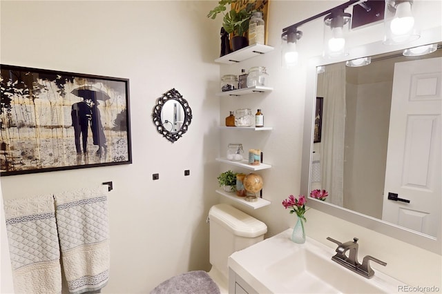 9620 W Chatfield Ave Unit D, Littleton, CO 80128 - bathroom with toilet and vanity