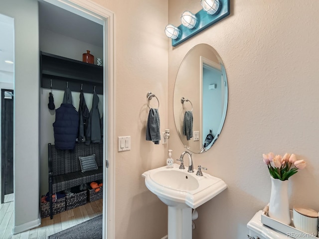 2896 Gemini Loop, Broomfield, CO 80023 - bathroom with baseboards and wood finished floors
