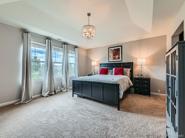 2896 Gemini Loop, Broomfield, CO 80023 - bedroom with carpet floors, a chandelier, and baseboards