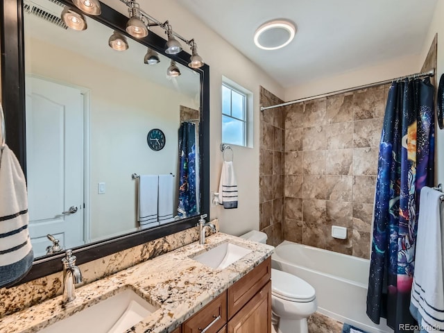 2896 Gemini Loop, Broomfield, CO 80023 - bathroom featuring toilet, double vanity, and shower / bath combination with curtain