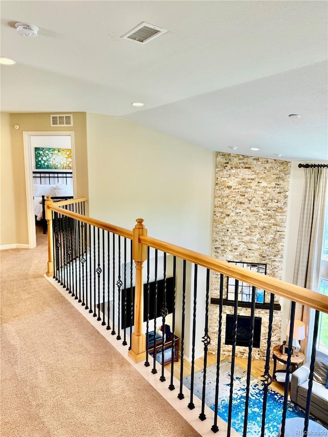 2896 Gemini Loop, Broomfield, CO 80023 - hall featuring plenty of natural light, an upstairs landing, and recessed lighting