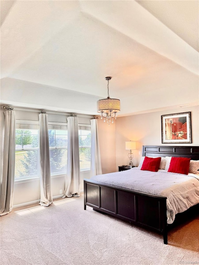 2896 Gemini Loop, Broomfield, CO 80023 - bedroom featuring light carpet and a chandelier