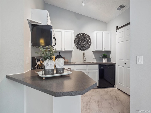 kitchen featuring black appliances, a sink, dark countertops, a peninsula, and lofted ceiling