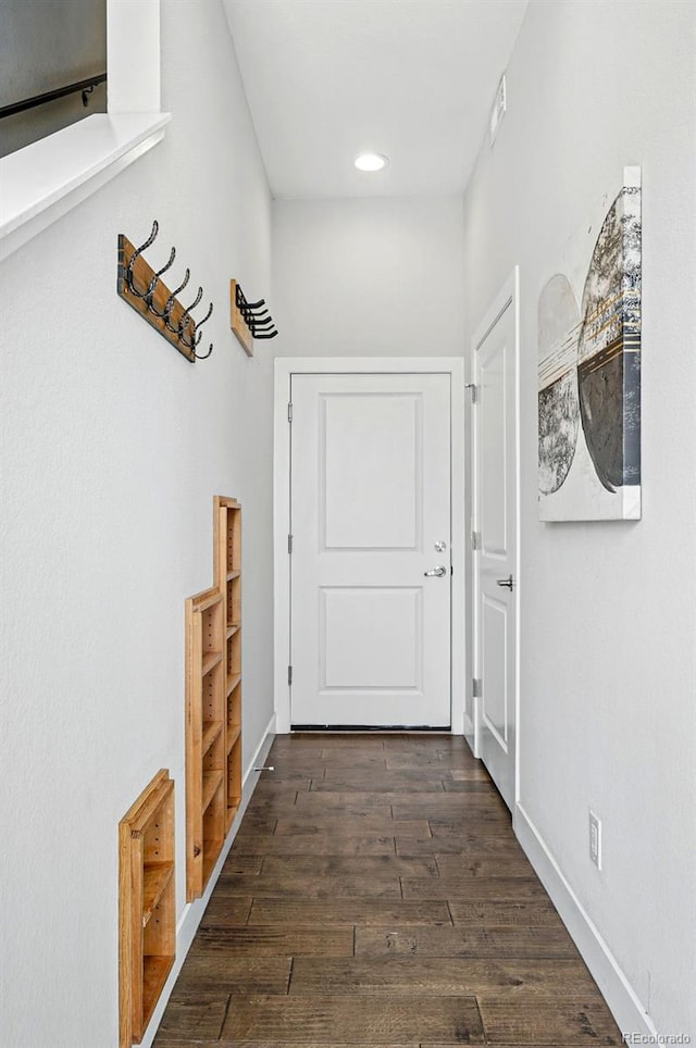 entryway featuring recessed lighting and dark wood-style floors