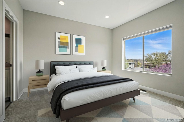 bedroom featuring baseboards and recessed lighting