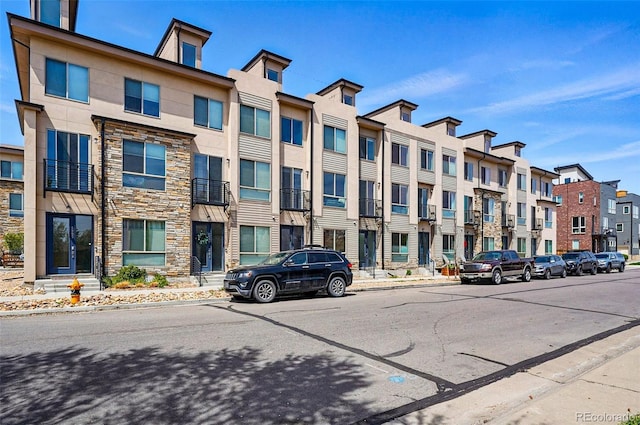 view of building exterior with a residential view