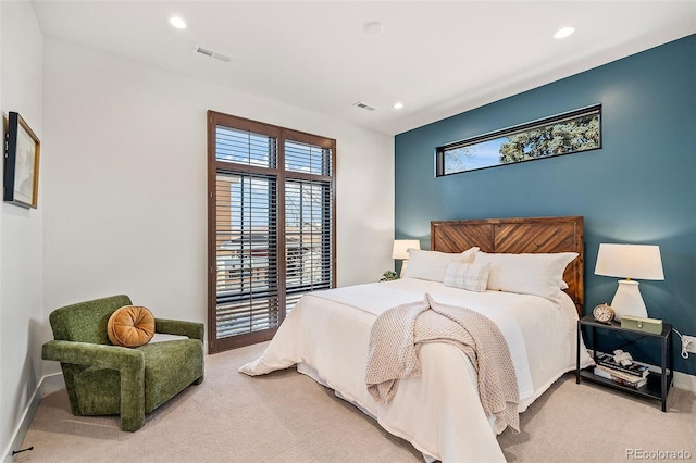 bedroom with carpet, visible vents, baseboards, and recessed lighting