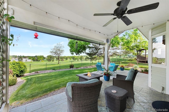 8040 W 78th Cir, Arvada, CO 80005 - view of patio / terrace featuring a fire pit and a ceiling fan