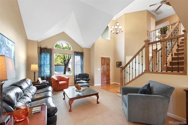 8040 W 78th Cir, Arvada, CO 80005 - living room featuring a chandelier, stairway, a ceiling fan, high vaulted ceiling, and baseboards