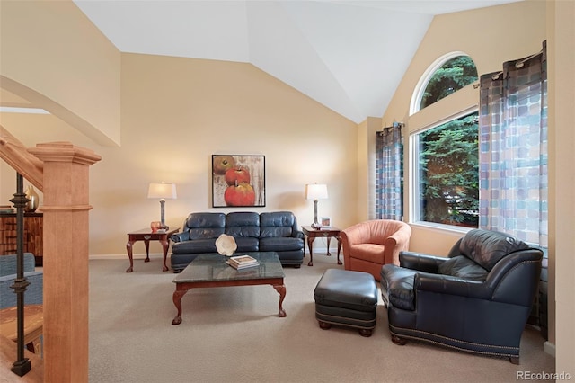 8040 W 78th Cir, Arvada, CO 80005 - living area featuring carpet floors, vaulted ceiling, baseboards, stairway, and arched walkways
