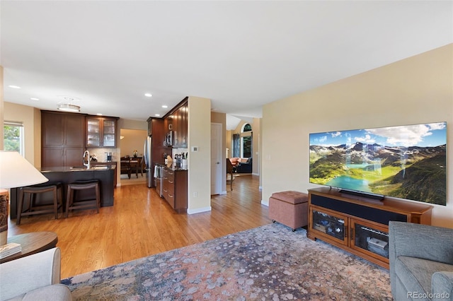 8040 W 78th Cir, Arvada, CO 80005 - living area with light wood-style flooring and recessed lighting