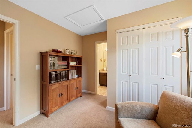 8040 W 78th Cir, Arvada, CO 80005 - sitting room featuring light colored carpet, baseboards, and attic access