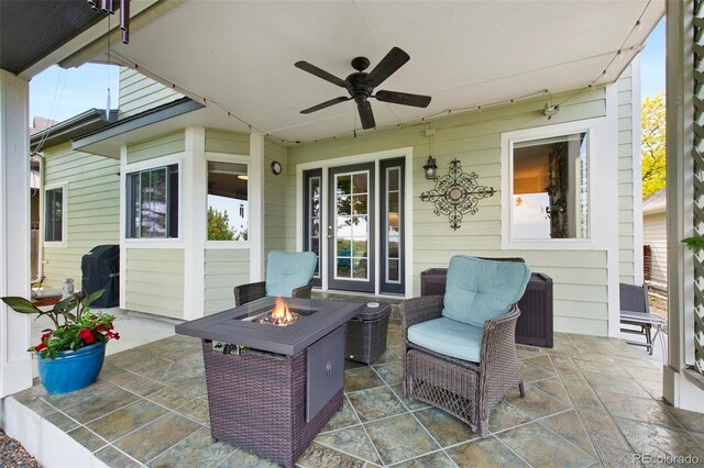 8040 W 78th Cir, Arvada, CO 80005 - view of patio with a fire pit and ceiling fan