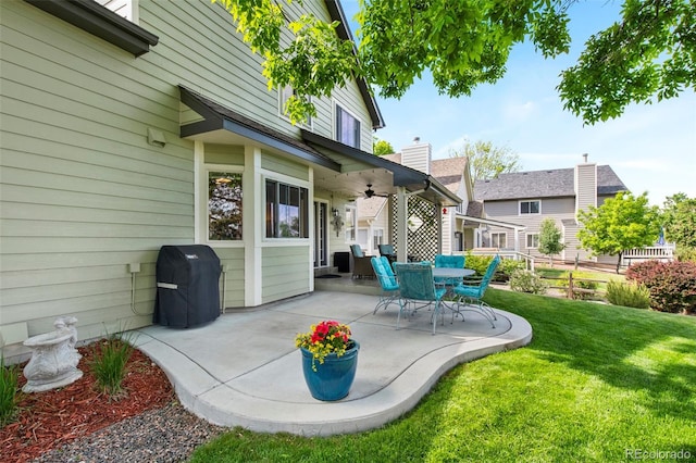 8040 W 78th Cir, Arvada, CO 80005 - view of patio with ceiling fan and a grill