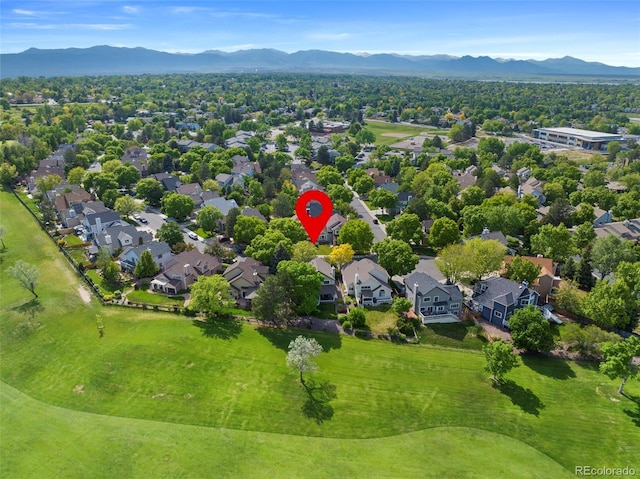 8040 W 78th Cir, Arvada, CO 80005 - aerial perspective of suburban area with a mountain backdrop and a golf course