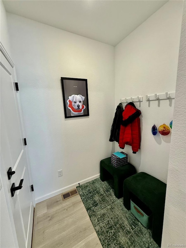 27580 E Cedar Pl, Aurora, CO 80018 - mudroom with wood finished floors and baseboards