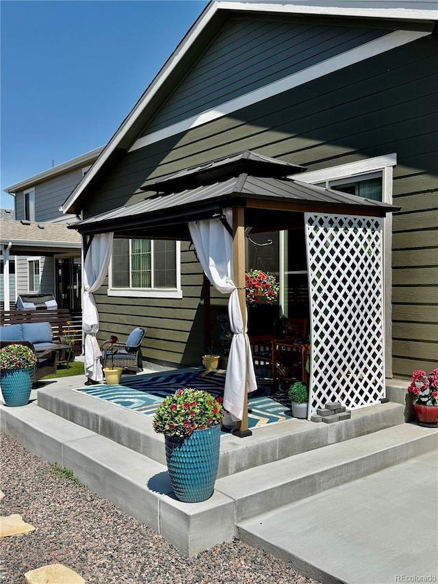 27580 E Cedar Pl, Aurora, CO 80018 - rear view of house featuring a gazebo