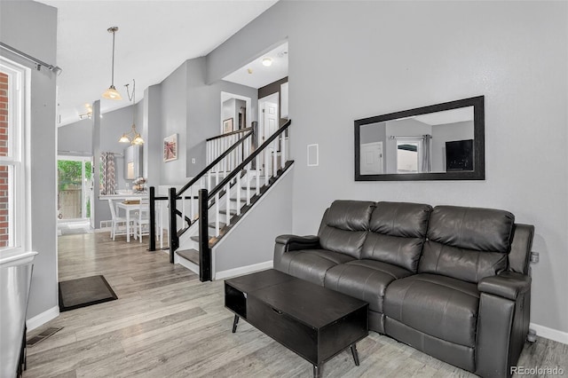1102 Conifer Ct, Highlands Ranch, CO 80126 - living area with wood finished floors and stairs