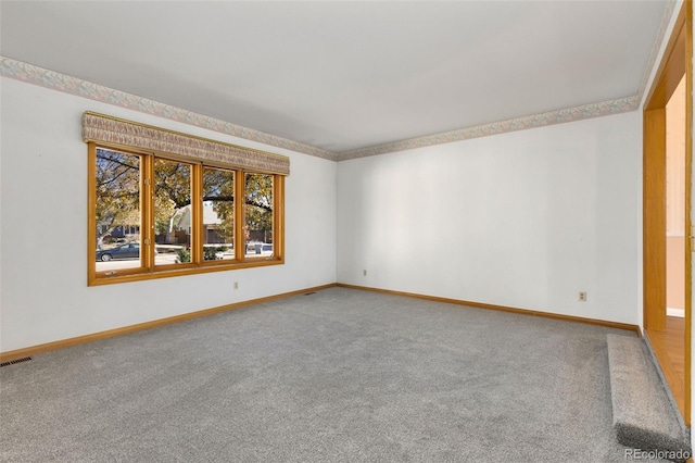 empty room featuring carpet