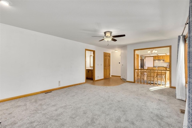 empty room with light carpet and ceiling fan