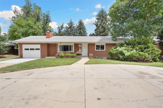 1304 S Lemay Ave, Fort Collins, CO 80524 - ranch-style house featuring driveway, an attached garage, a front lawn, brick siding, and a chimney