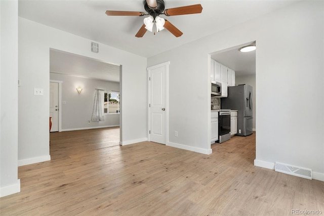 1304 S Lemay Ave, Fort Collins, CO 80524 - unfurnished living room featuring a ceiling fan and light wood-type flooring