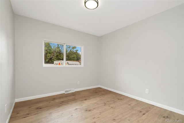 1304 S Lemay Ave, Fort Collins, CO 80524 - spare room featuring baseboards and wood finished floors