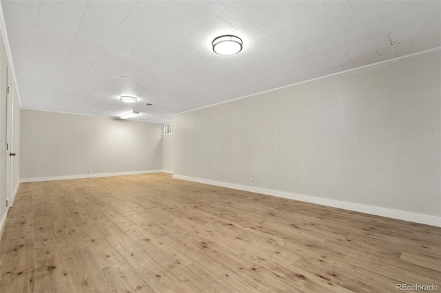1304 S Lemay Ave, Fort Collins, CO 80524 - spare room featuring light wood-type flooring and ornamental molding