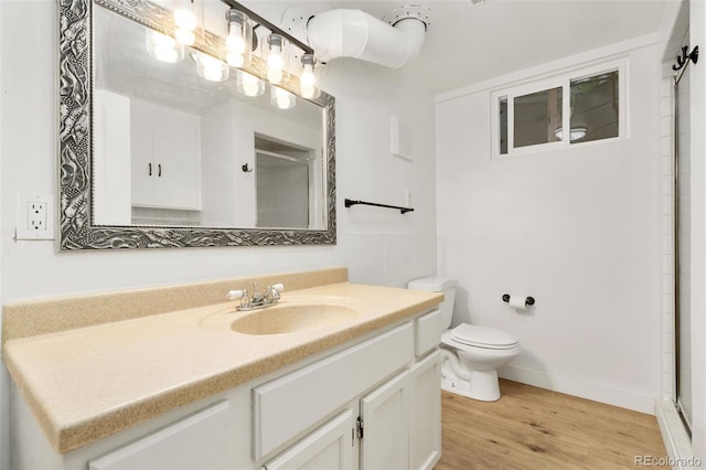 1304 S Lemay Ave, Fort Collins, CO 80524 - bathroom with vanity, wood finished floors, and a shower