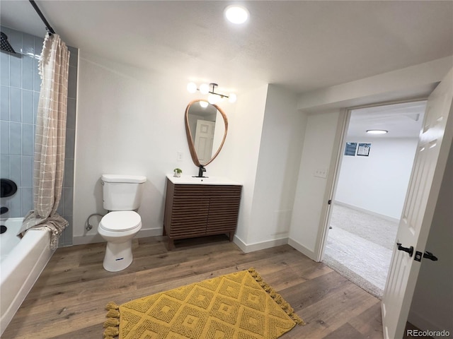 3355 Moorhead Ave, Boulder, CO 80305 - full bath with vanity, toilet, shower / bath combo, wood finished floors, and baseboards