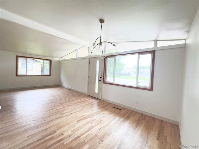 3355 Moorhead Ave, Boulder, CO 80305 - unfurnished room featuring a chandelier, light wood finished floors, and baseboards