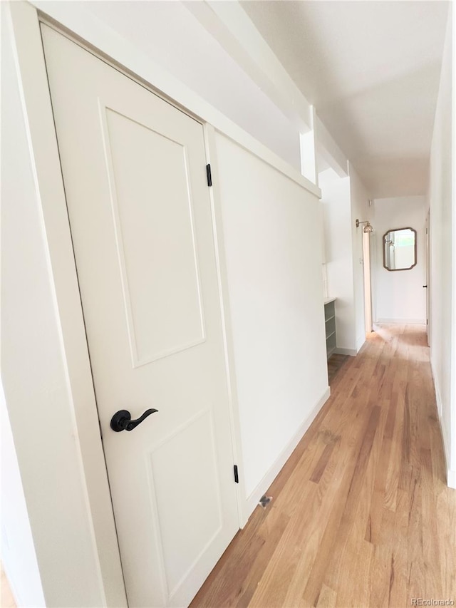 3355 Moorhead Ave, Boulder, CO 80305 - hall with light wood-style floors and baseboards