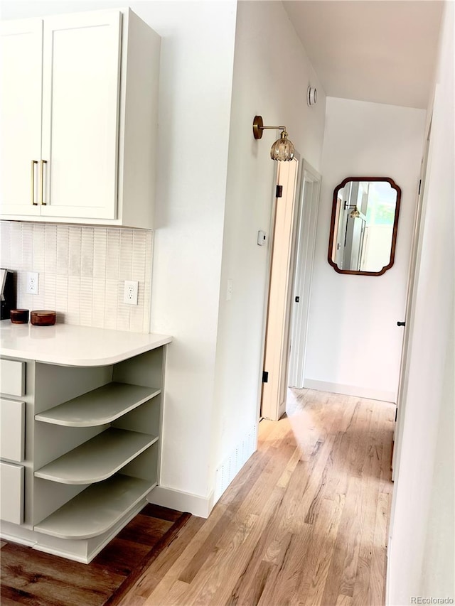 3355 Moorhead Ave, Boulder, CO 80305 - corridor with light wood-type flooring and baseboards