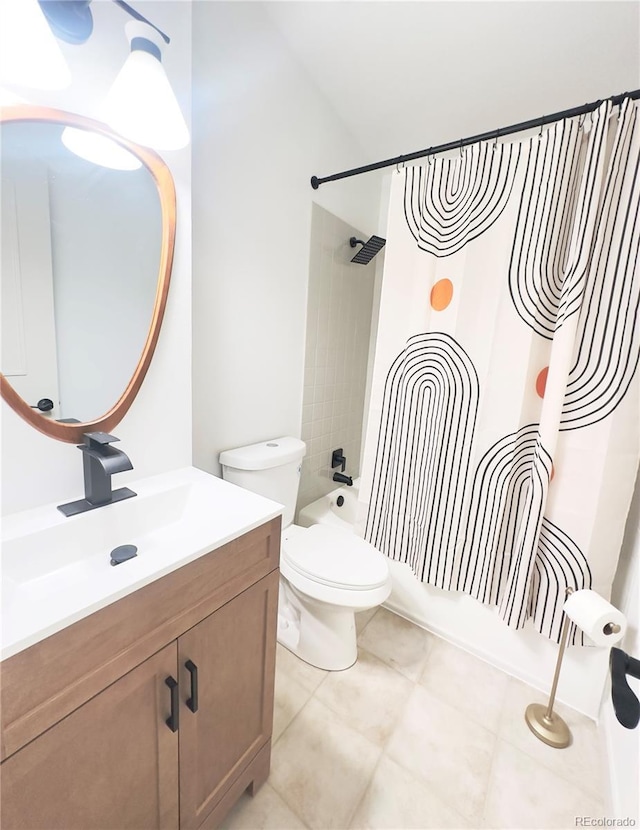 3355 Moorhead Ave, Boulder, CO 80305 - full bath with shower / bath combo with shower curtain, vanity, toilet, and tile patterned flooring