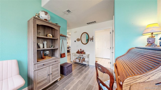 10449 Paris St Unit 207, Commerce City, CO 80640 - sitting room featuring wood finished floors