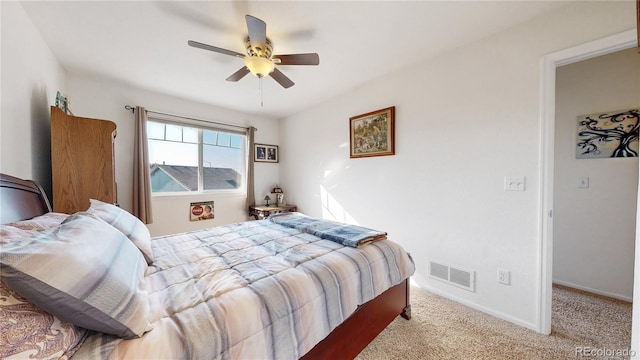 10449 Paris St Unit 207, Commerce City, CO 80640 - carpeted bedroom with a ceiling fan and baseboards