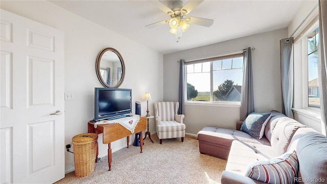 10449 Paris St Unit 207, Commerce City, CO 80640 - living room featuring carpet floors, plenty of natural light, and a ceiling fan