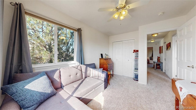 10449 Paris St Unit 207, Commerce City, CO 80640 - carpeted living area featuring a ceiling fan