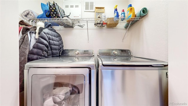 10449 Paris St Unit 207, Commerce City, CO 80640 - washroom featuring washing machine and clothes dryer