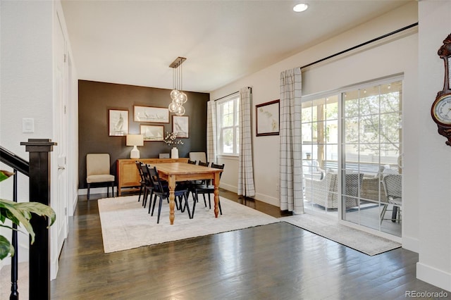 dining area with dark wood-type flooring, recessed lighting, and baseboards