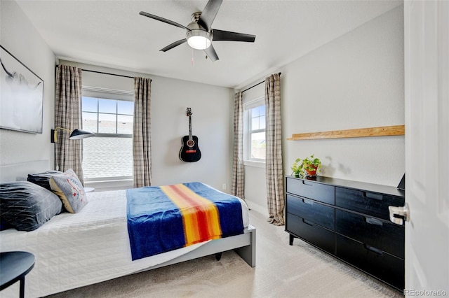 bedroom featuring carpet floors and a ceiling fan