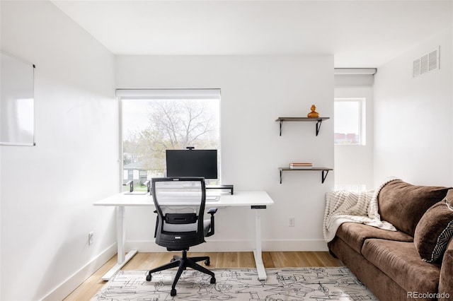 office space featuring light hardwood / wood-style flooring