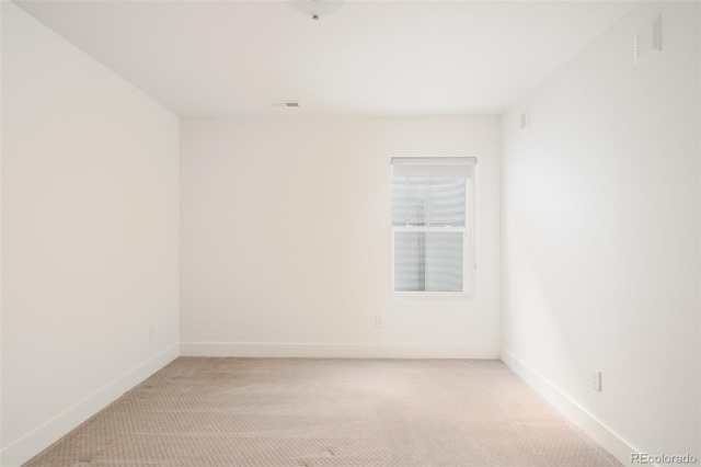 empty room with light carpet