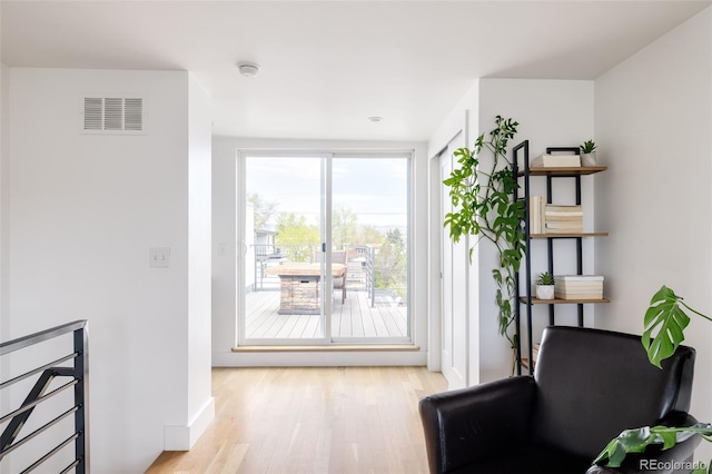 living area featuring light hardwood / wood-style floors