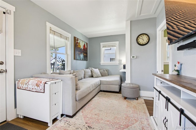 130 N 8th Ave, Brighton, CO 80601 - living area featuring dark wood-style flooring