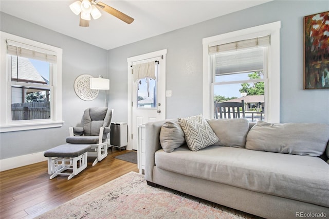130 N 8th Ave, Brighton, CO 80601 - living room featuring wood finished floors and ceiling fan