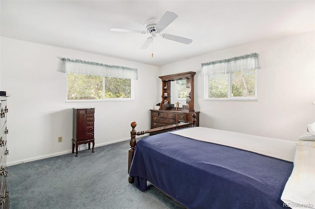 bedroom with carpet flooring, baseboards, and a ceiling fan