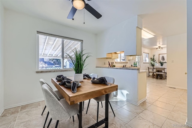 home office with ceiling fan